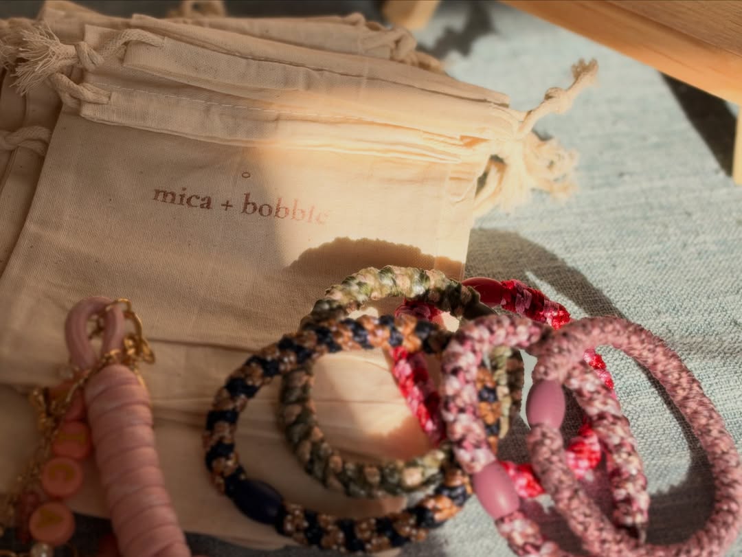 Finished charm bracelets with mica + bobble gift pouches